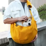 Reversible Dog Carrier Sling Bag with Storage Pocket – Paw Pal Collection  |  Owleys Partnership - View 1