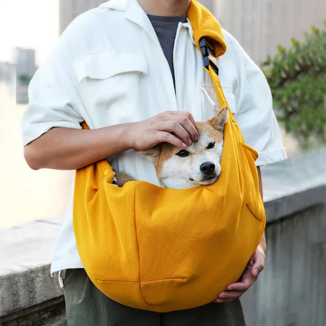 Reversible Dog Carrier Sling Bag with Storage Pocket – Paw Pal Collection  |  Owleys Partnership