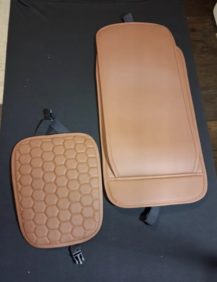 Two caramel covers laid flat, showing the copper-brown color