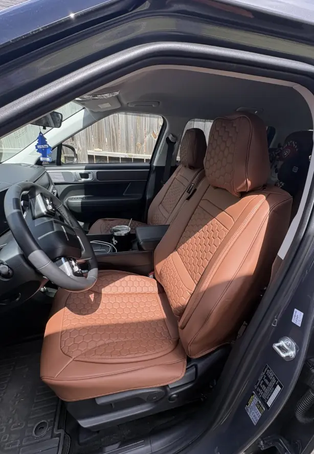 Caramel cover installed on the driver seat